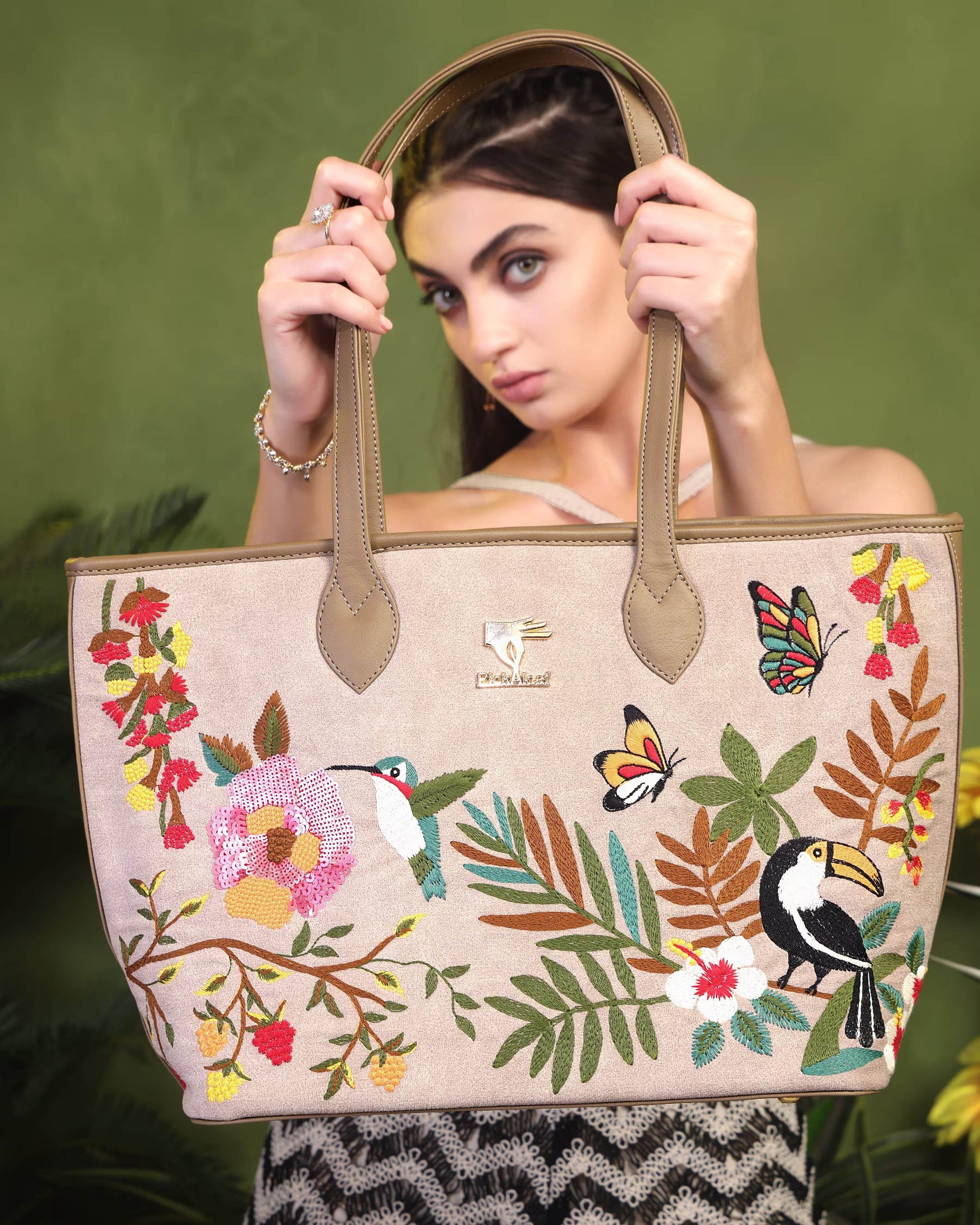 Beige embroidered large tote bag for women in vegan leather by PickAleaf with spacious design for travel, shopping and daily use