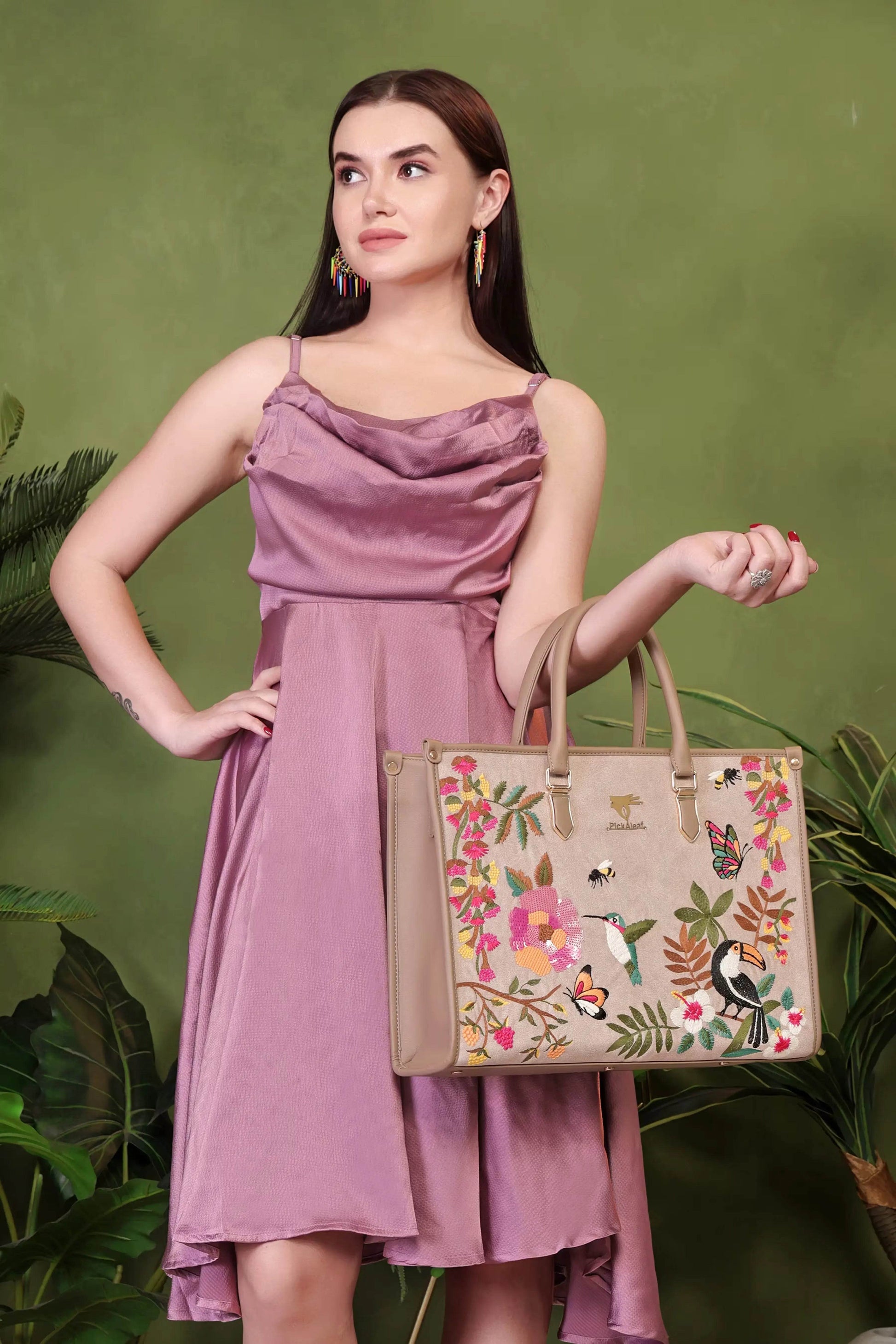 Beige party tote bag for women in cruelty free vegan leather by PickAleaf with embroidered design for outings and special occasions