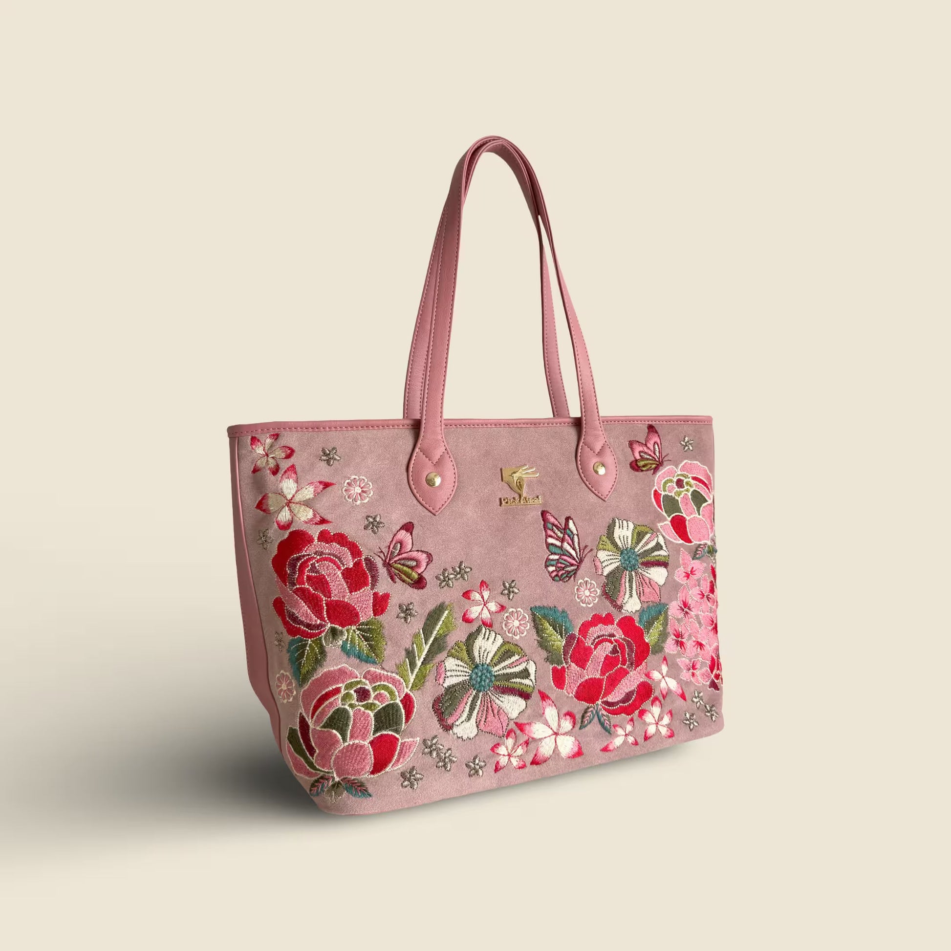 Pink vegan leather tote bag with Petal Eden floral embroidery