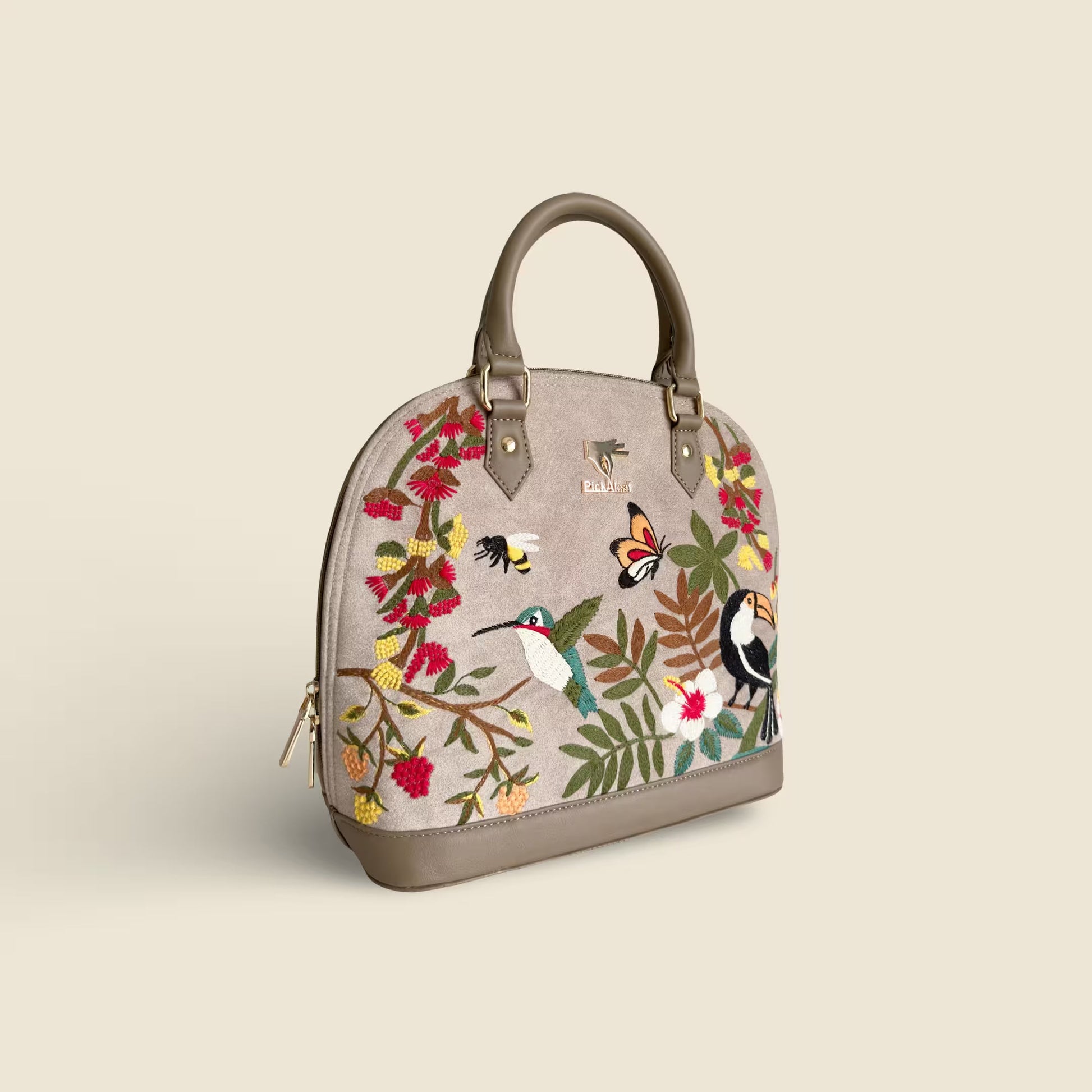 Beige embroidered designer handbag for women in vegan leather by PickAleaf, cruelty free with floral detail for weddings, parties and festive occasions