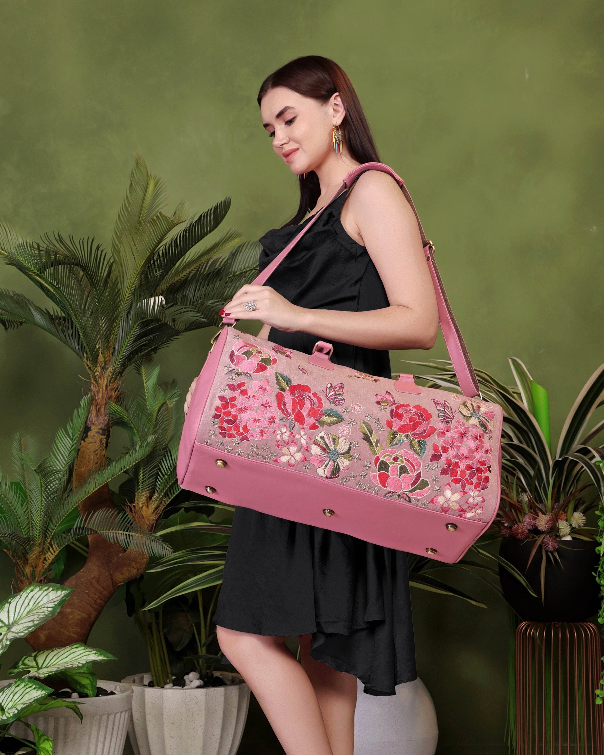 Pink weekender check-in duffel bag for women in cruelty free vegan leather by PickAleaf for short trips and relaxed travel use