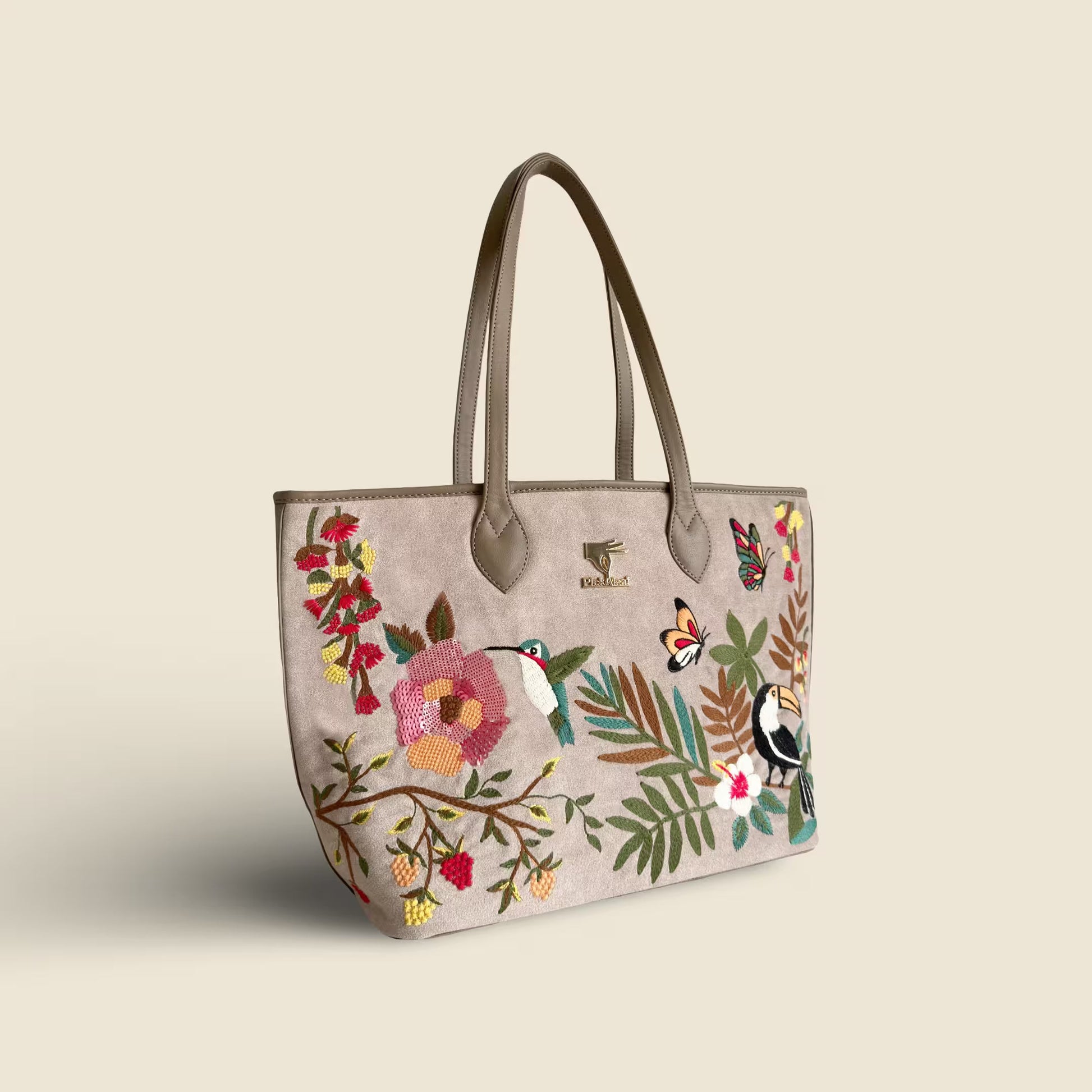 Beige embroidered large tote bag for women in vegan leather by PickAleaf with spacious design for travel, shopping and daily use