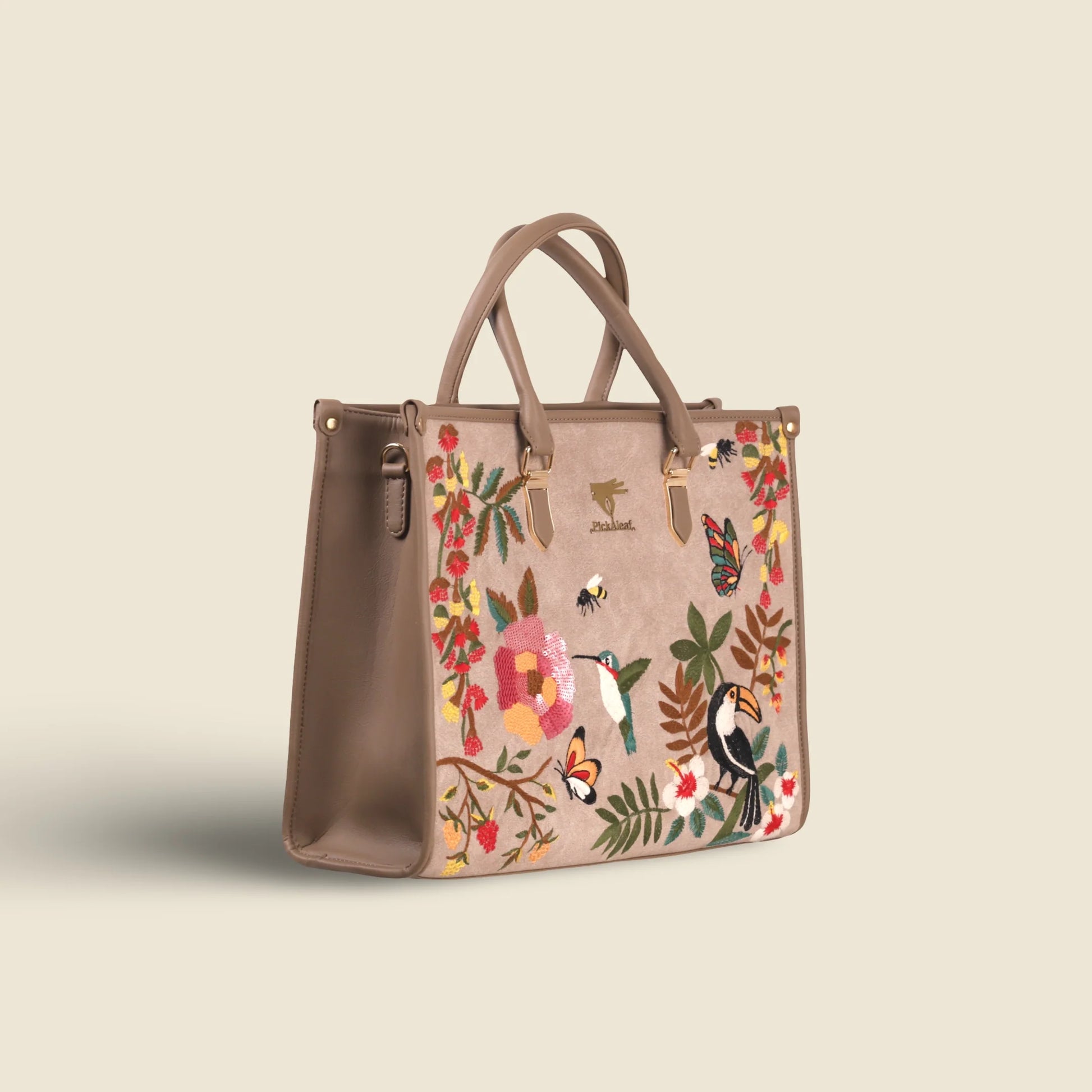 Beige party tote bag for women in cruelty free vegan leather by PickAleaf with embroidered design for outings and special occasions