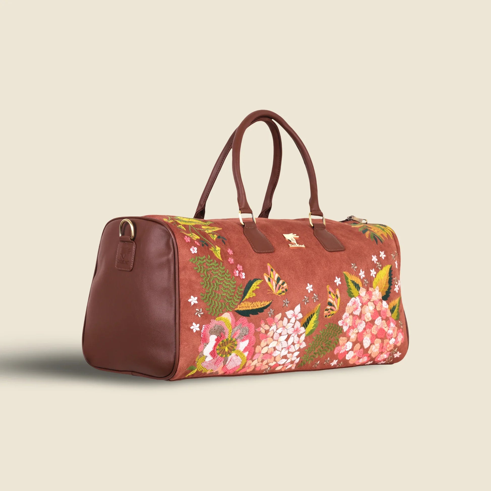 Brown travel luggage duffel bag for women in cruelty free vegan leather by PickAleaf for cabin travel and weekend trips